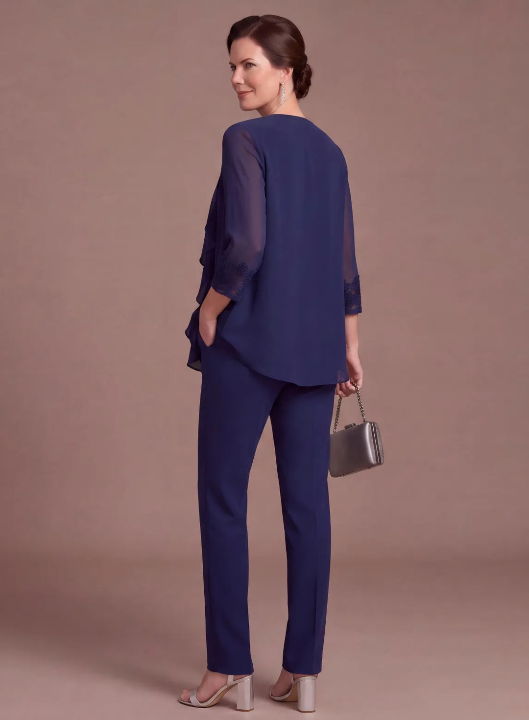 Navy blue chiffon pantsuit with layered blouse and straight-leg pants, back side view