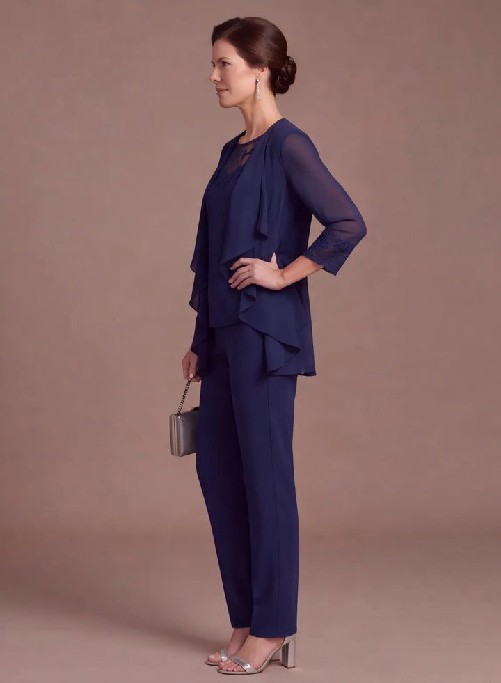 Navy blue chiffon pantsuit set with layered top and tailored pants, side view