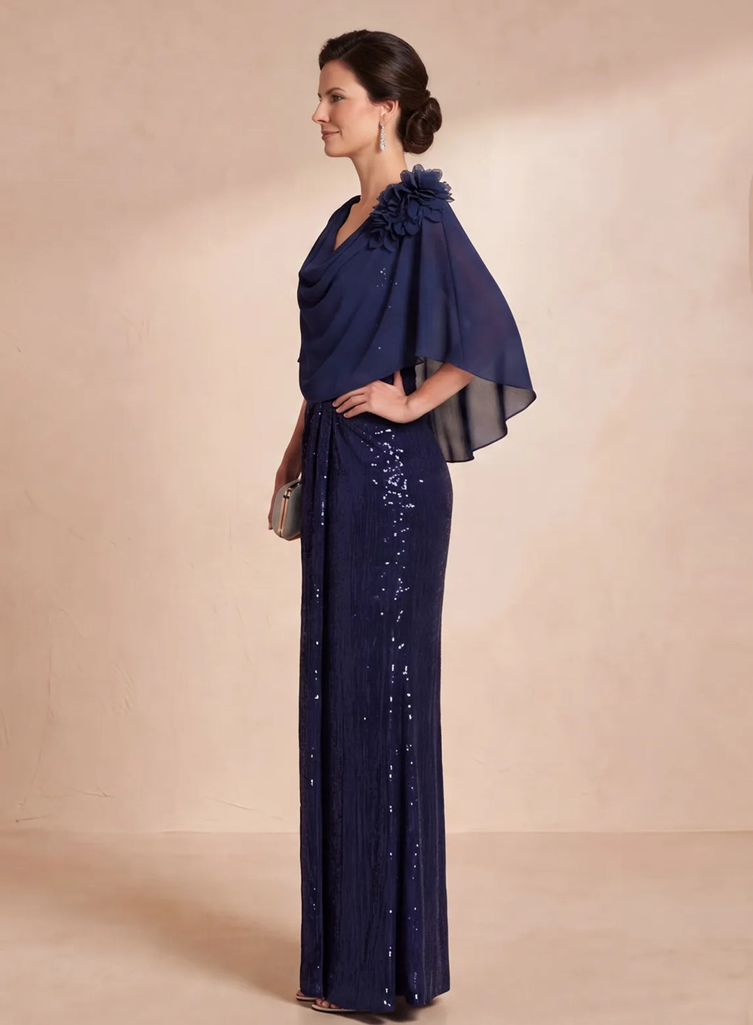 Side view of navy blue chiffon cape sequin mother of the bride dress