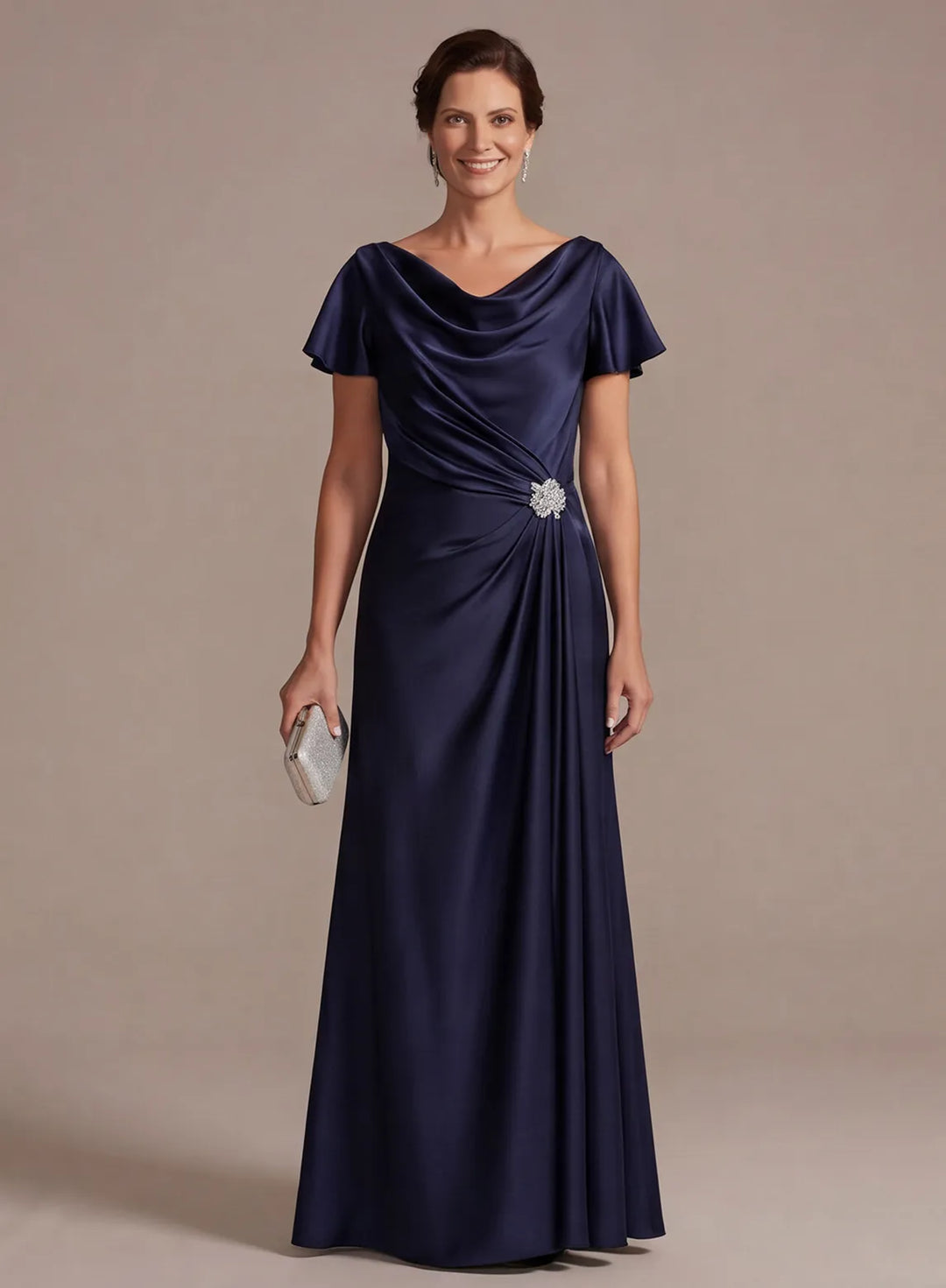Navy blue satin mother of the bride dress with draped neckline and elegant floor length silhouette