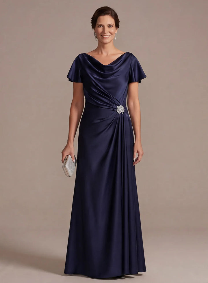 Navy blue satin mother of the bride dress with draped neckline and elegant floor length silhouette
