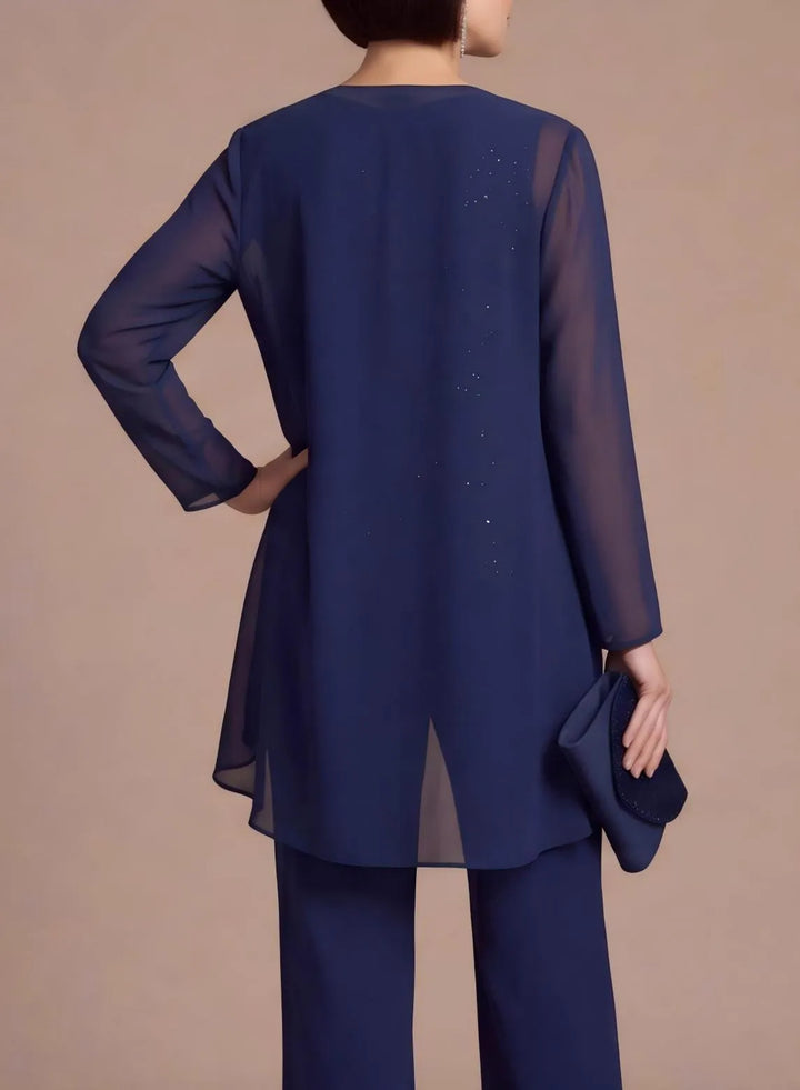 Elegant chiffon cape overlay detail on navy wedding pantsuit