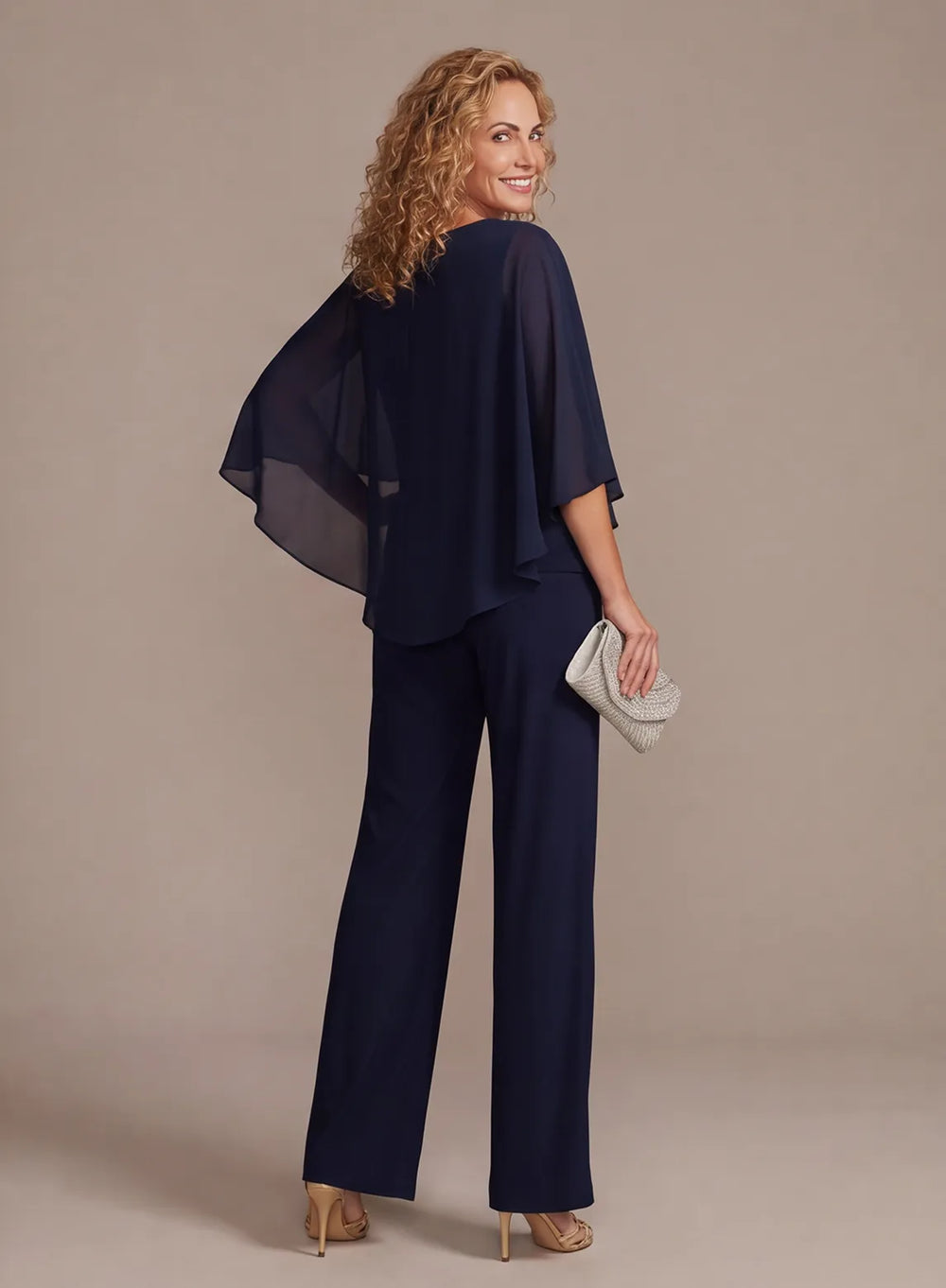 Back view of elegant navy chiffon cape pantsuit for wedding occasions