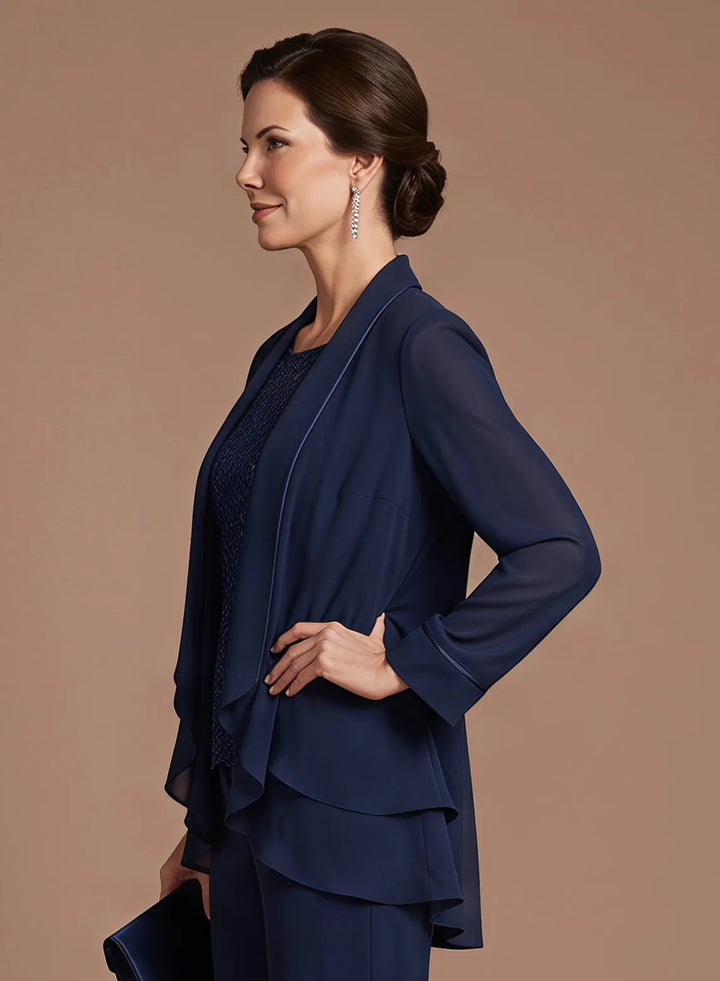 Side view highlighting the flowing layered design of the navy chiffon jacket and lace top.