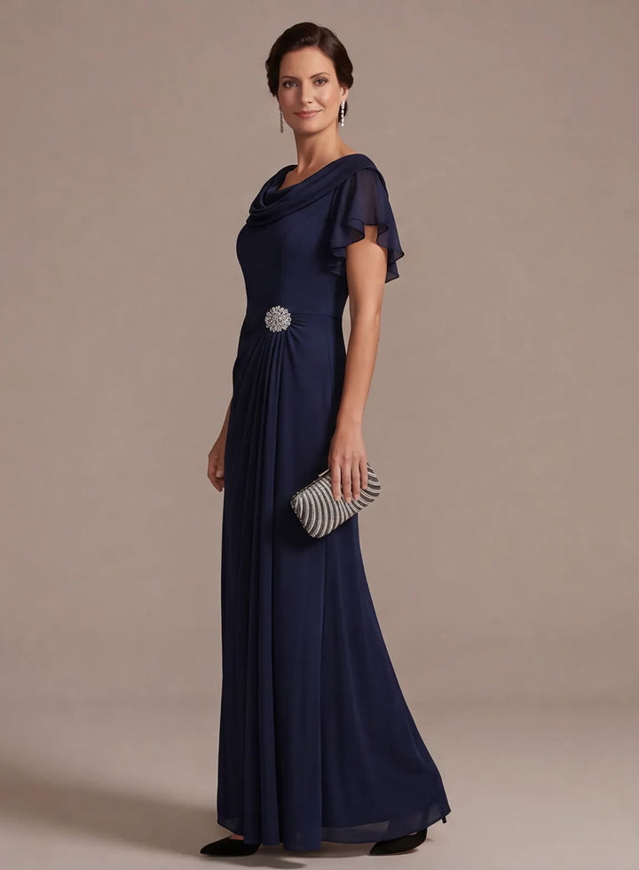 Navy floor length mother of the bride dress side view with flowing silhouette