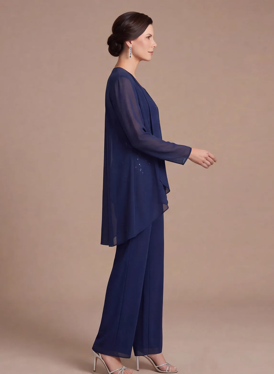 Navy lace pantsuit with flowing chiffon cape side view for wedding occasions