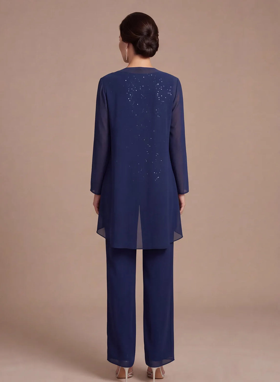 Back view of navy mother of the bride pantsuit with elegant chiffon cape