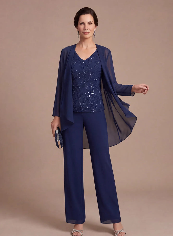 Navy mother of the bride pantsuit with lace top and chiffon cape front view