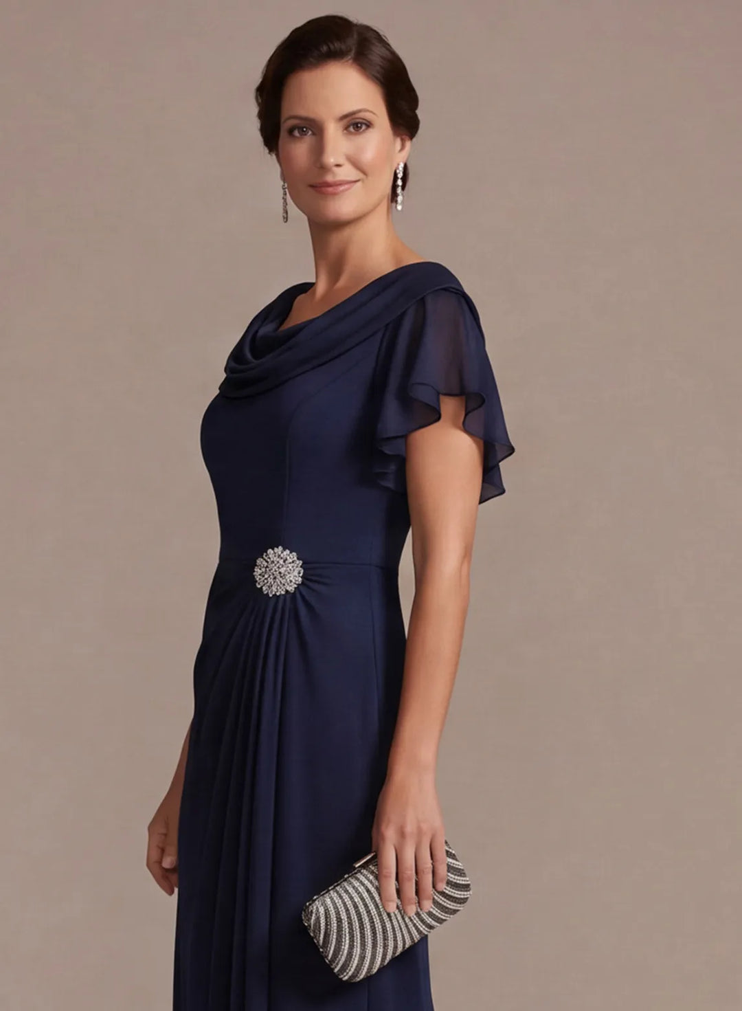 Navy formal dress with ruched waist and elegant embellished detail
