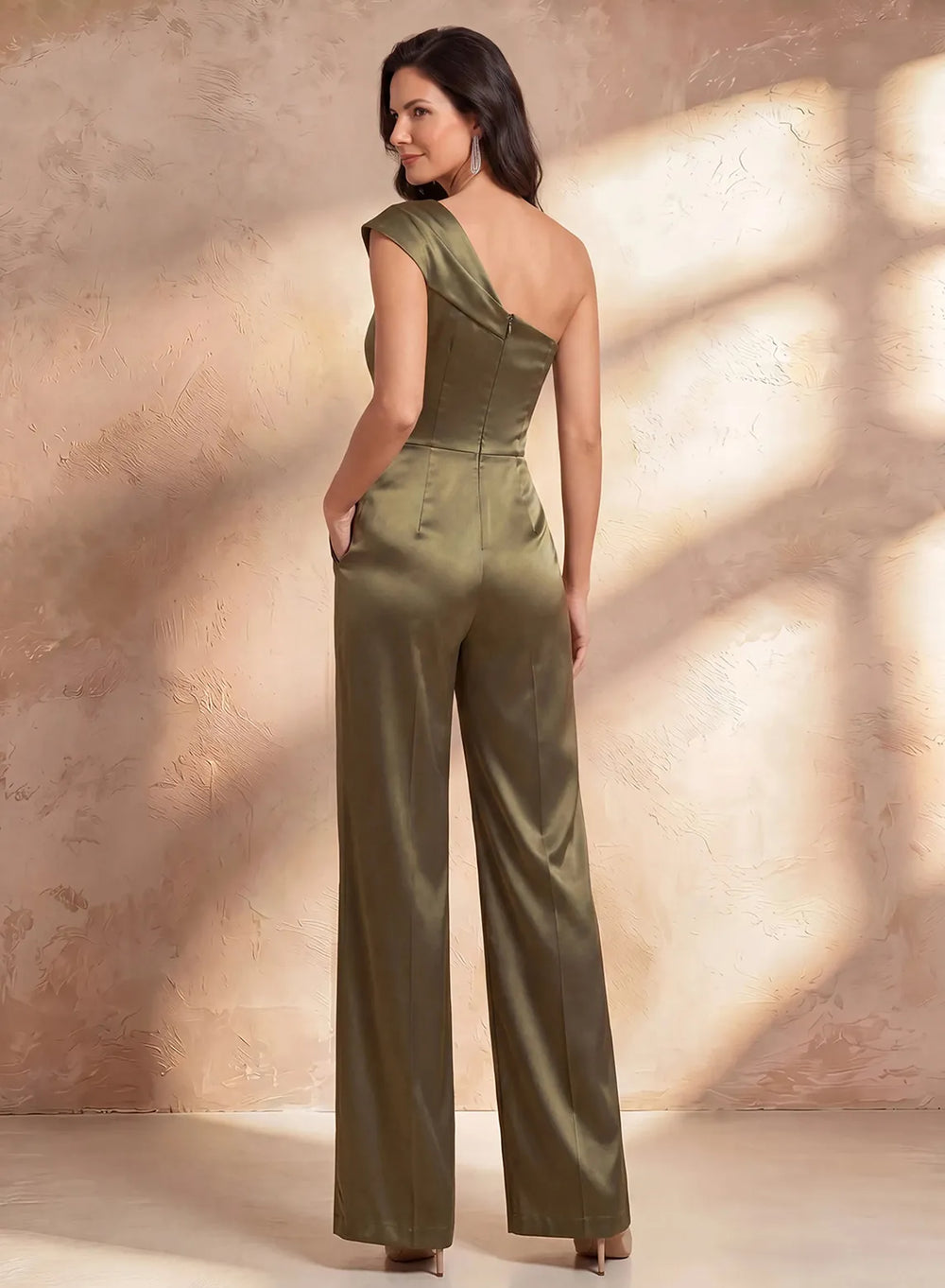 Back view of olive green satin jumpsuit showing elegant tailored fit and flowing wide legs