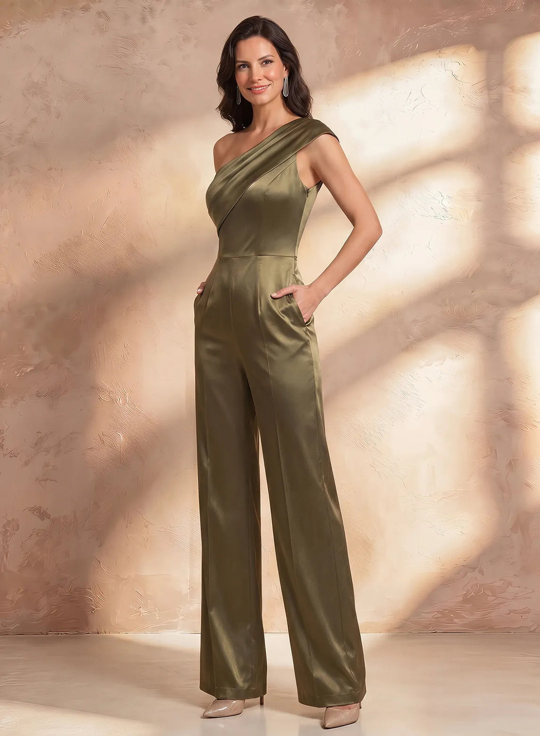 Olive green wedding guest jumpsuit featuring luxurious satin fabric and elegant wide leg silhouette