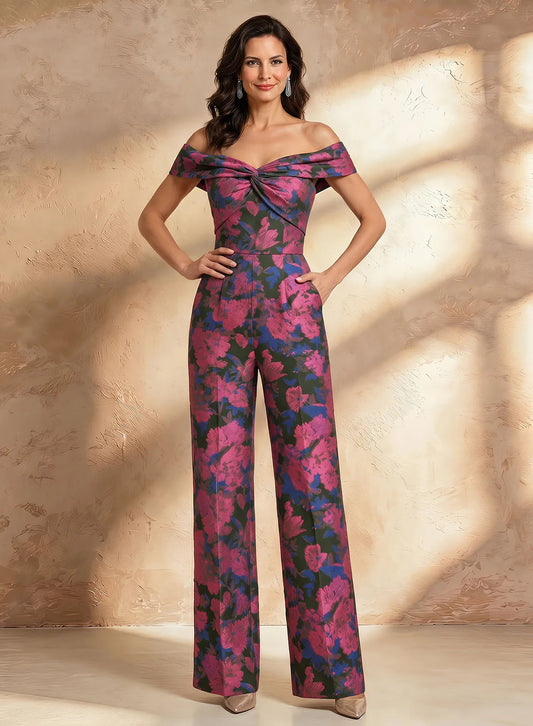 Pink floral off shoulder formal jumpsuit with wide leg pants for women attending weddings and special events