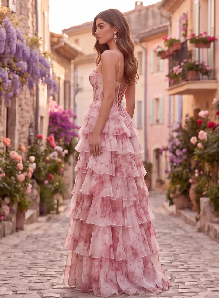 Pink floral organza prom dress side view with tiered ruffle skirt