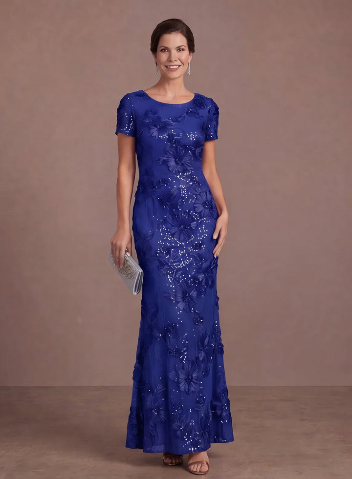 Royal blue sequin evening gown with floral embellishments and a fitted mermaid silhouette