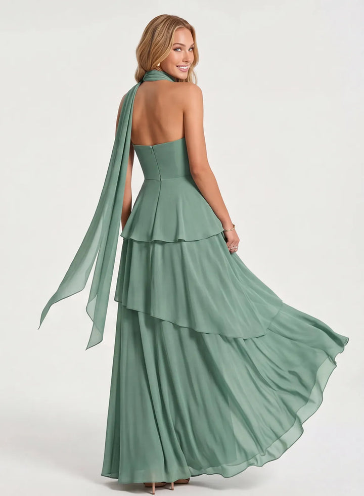 Sage green bridesmaid dress back view with elegant chiffon layers and floor length silhouette