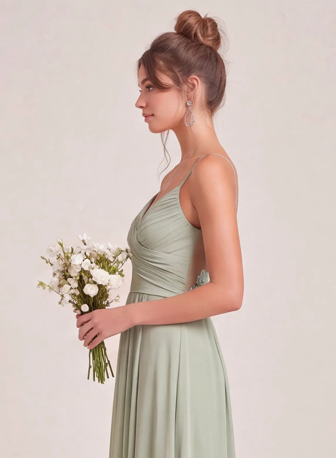 Sage green bridesmaid dress side view, graceful wedding party gown