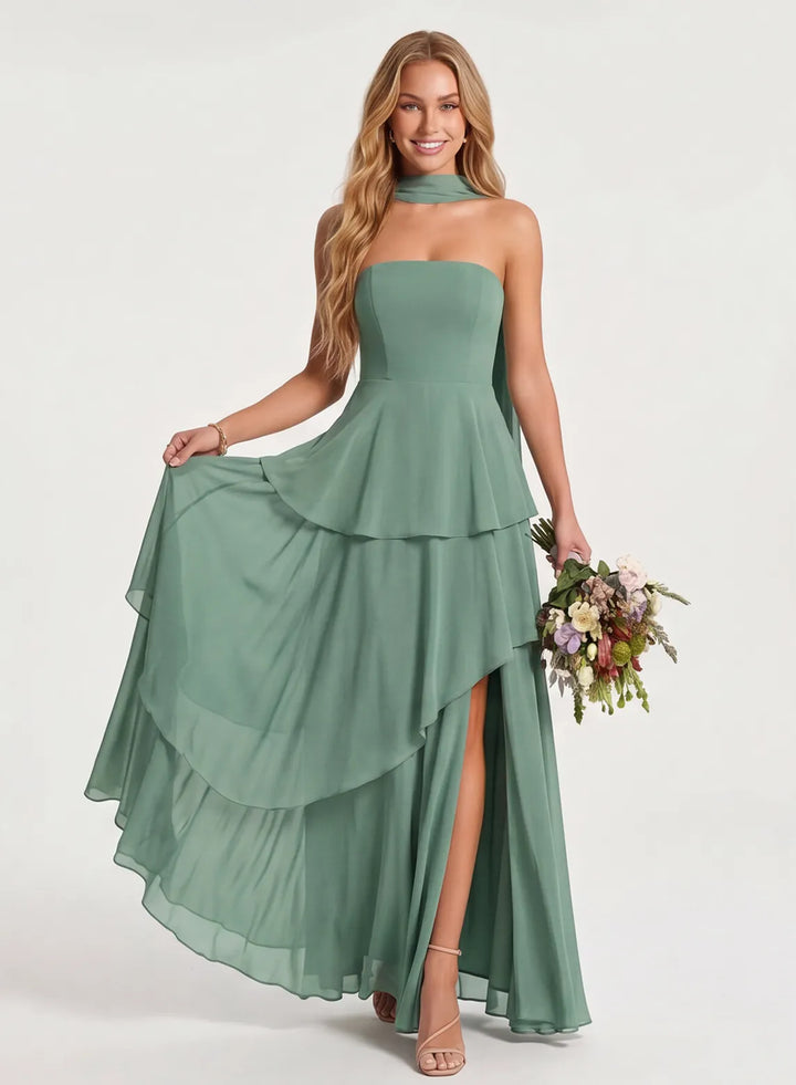 Sage green chiffon wedding party dress with floral bouquet and romantic flowing design
