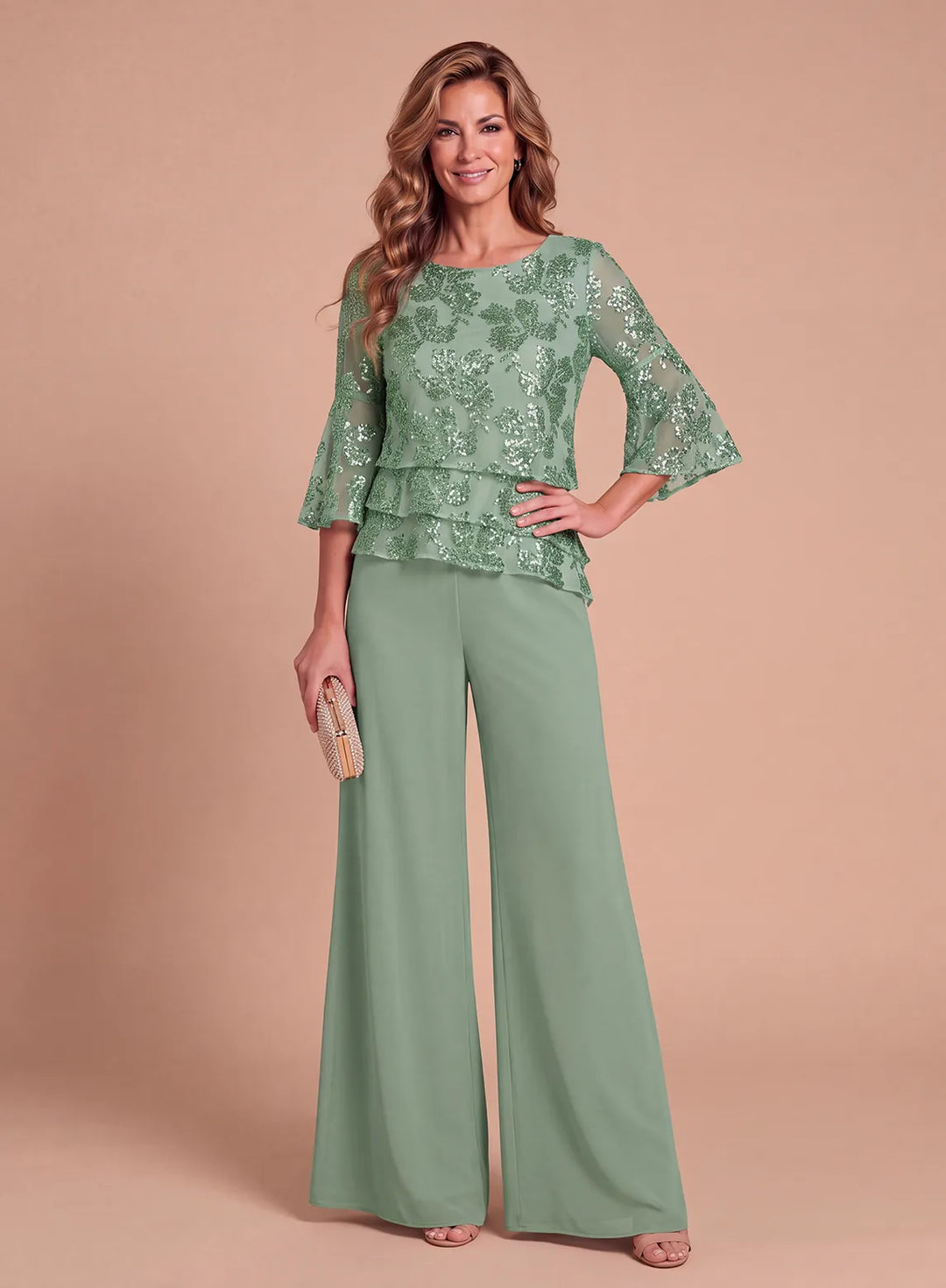 Sage green sequin mother of the bride pantsuit with layered ruffle top and wide-leg pants, front view