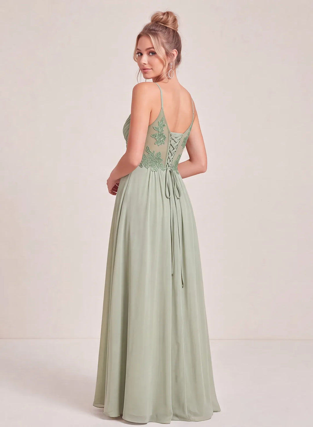 Sage green long bridesmaid gown with elegant floor length silhouette