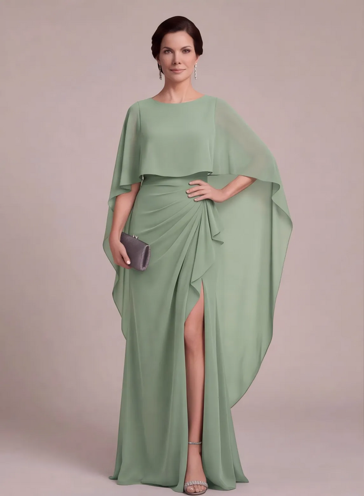 Sage green mother of the bride dress with elegant cape sleeves and ruched waist