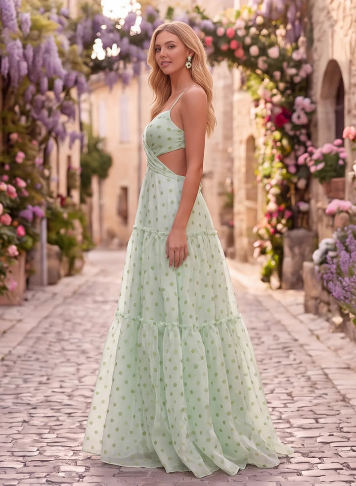 Sage green polka dot organza prom dress side view with tiered skirt