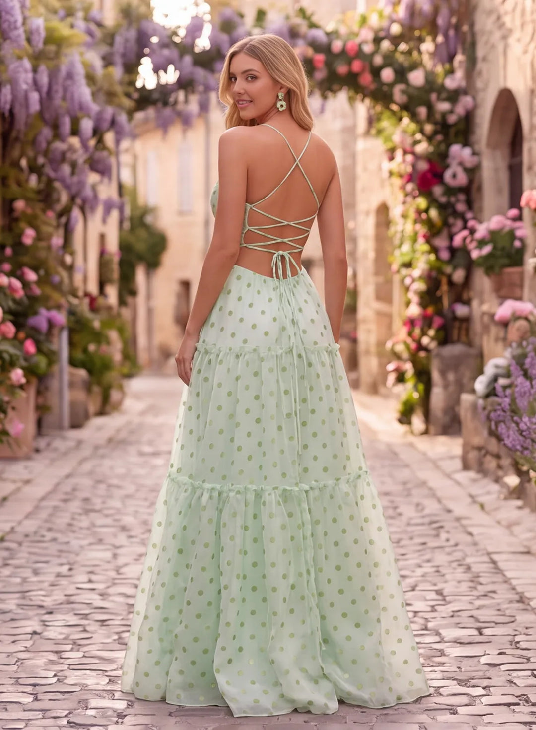 Sage green polka dot organza prom dress side view with tiered skirt