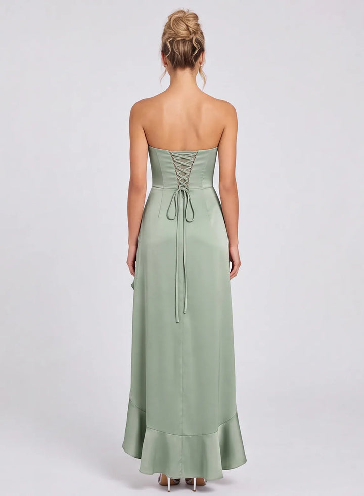 Back view of sage green satin strapless bridesmaid dress