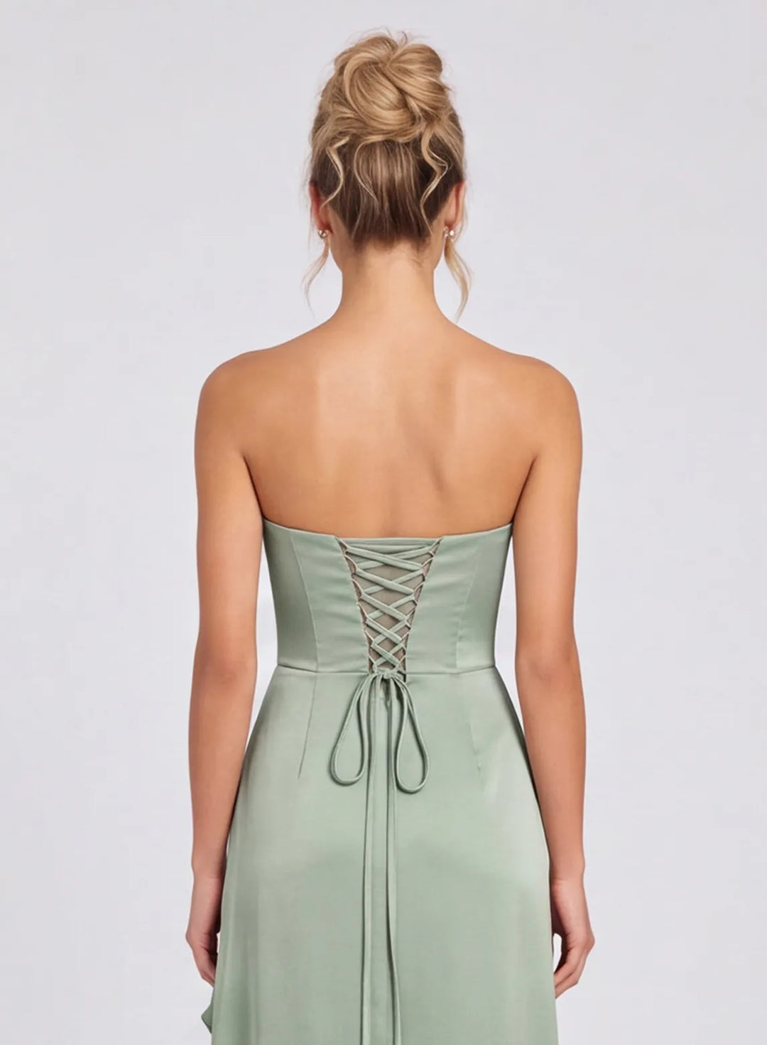 Rear view of sage green satin strapless bridesmaid dress