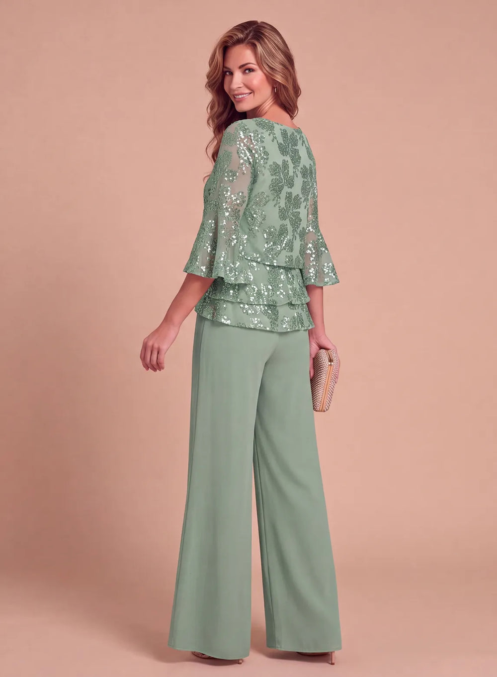 Side view of sage green formal pantsuit with floral sequin top and flowing wide-leg pants
