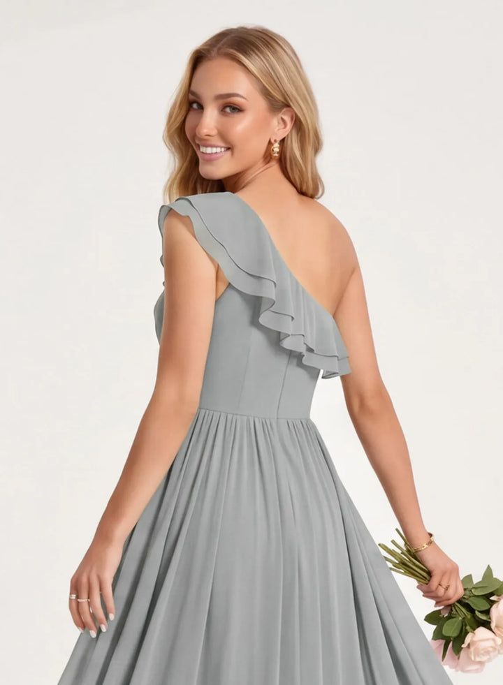 Back view of a silver chiffon bridesmaid dress with a floor length skirt