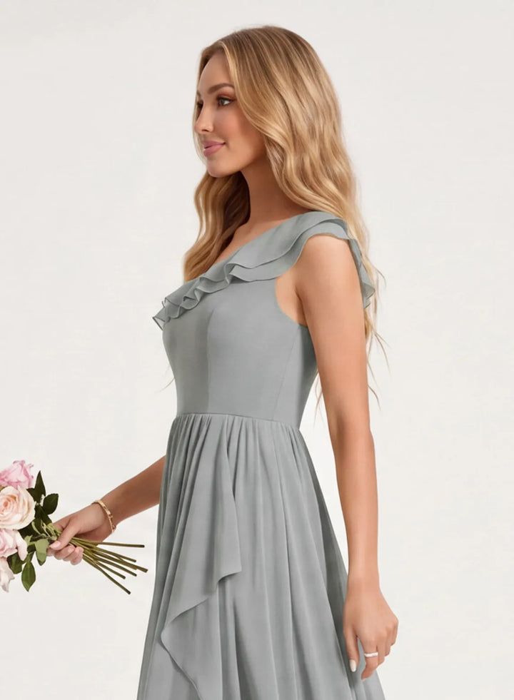 Model wearing a silver chiffon bridesmaid dress for a wedding