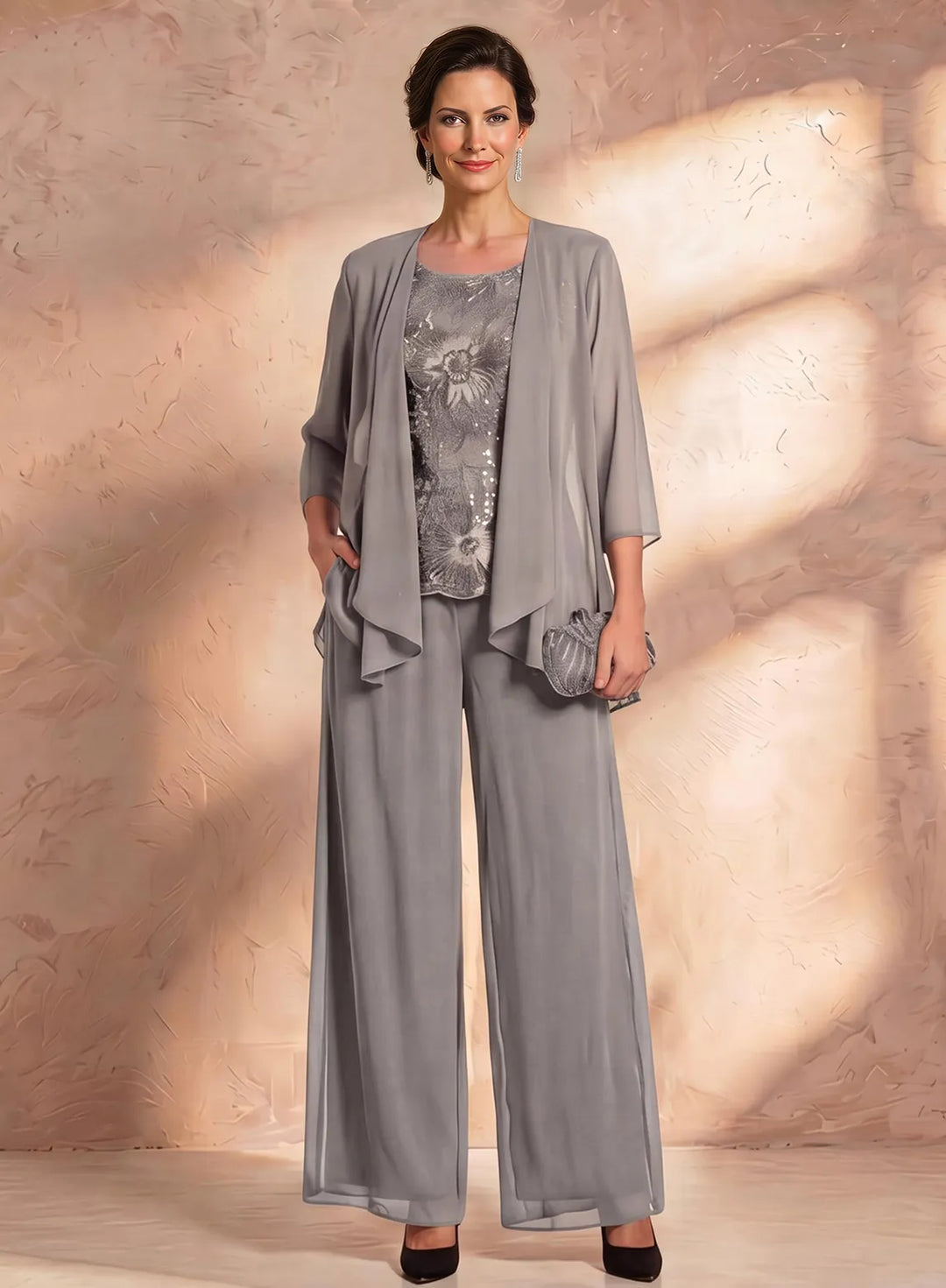 Silver gray mother of the bride pantsuit with elegant lace details and wide leg formal pants