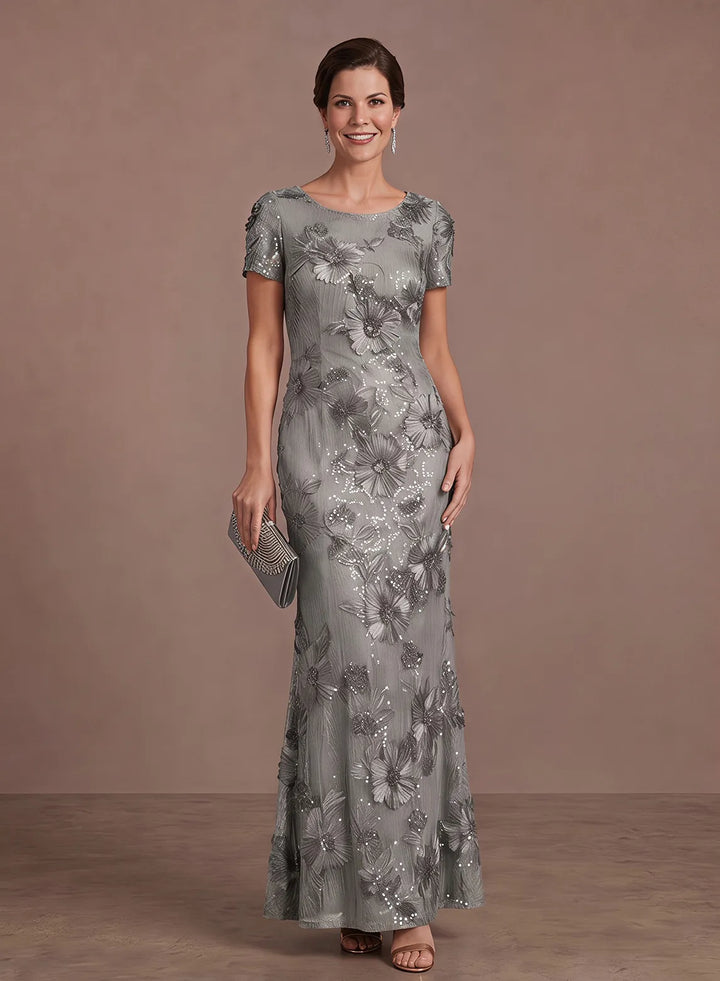Silver gray formal gown featuring shimmering floral sequins and a graceful mermaid shape