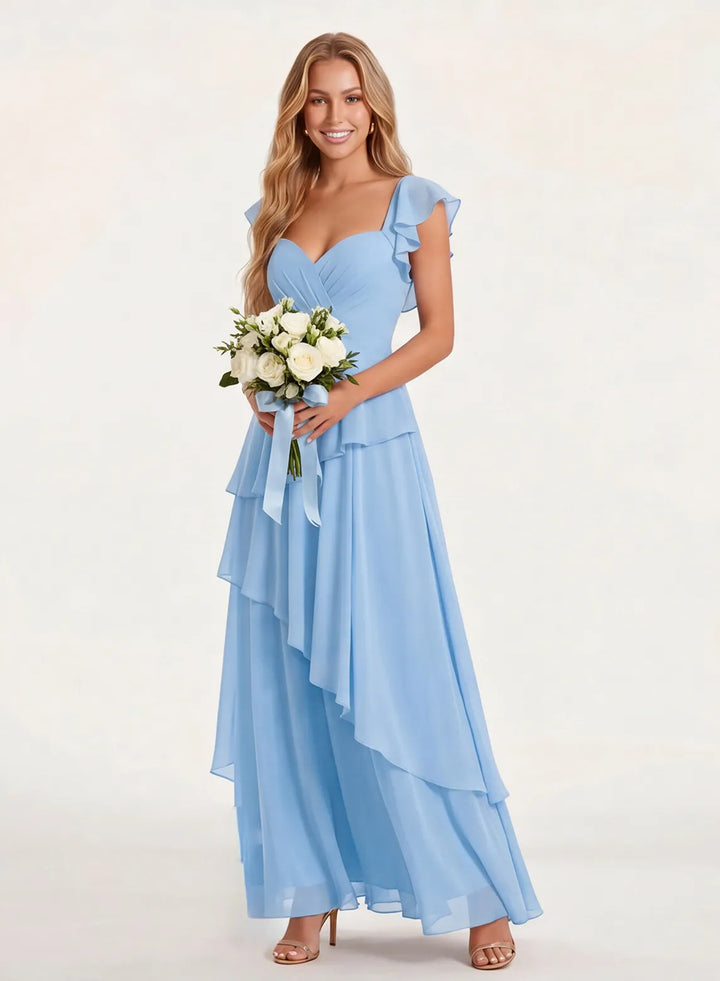 Sky blue bridesmaid gown with bouquet for romantic wedding ceremony