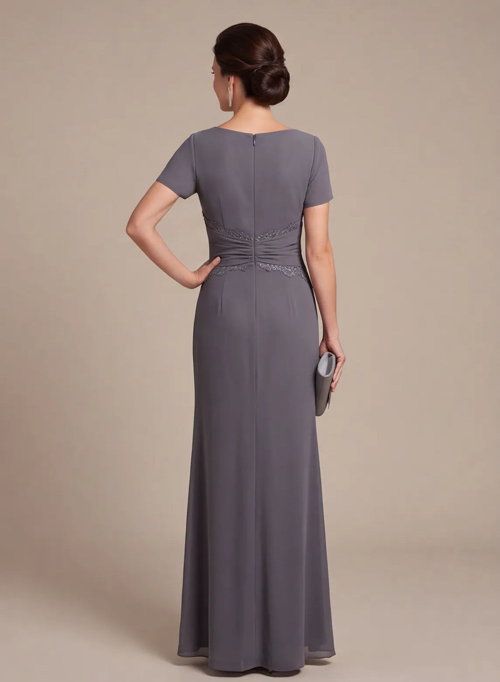 Back view of a steel gray floor-length evening dress with a smooth silhouette