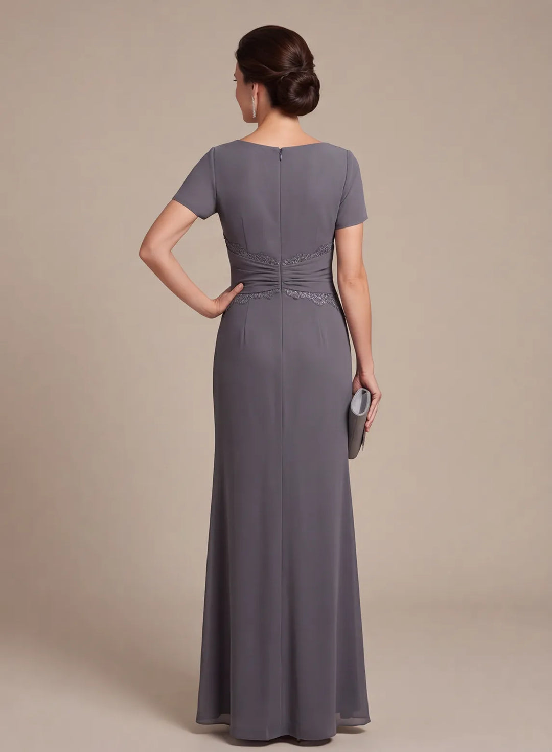 Back view of a steel gray floor-length evening dress with a smooth silhouette