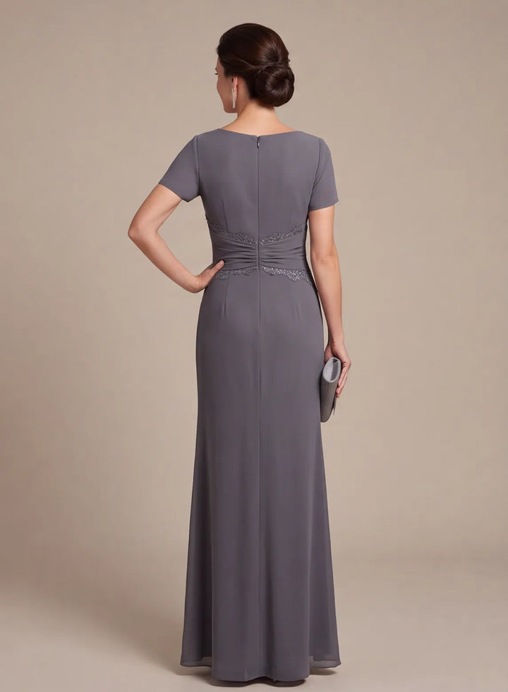 Back view of a steel gray floor-length evening dress with a smooth silhouette