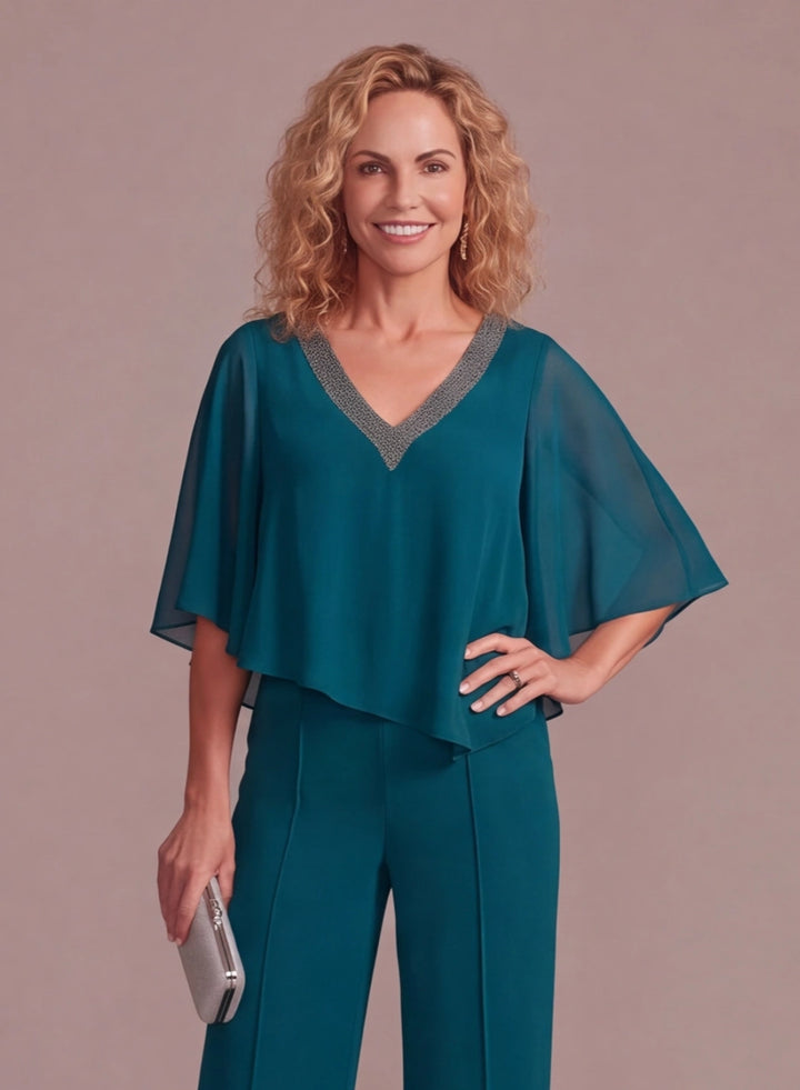 Teal beaded V neck cape top detail for elegant wedding outfit