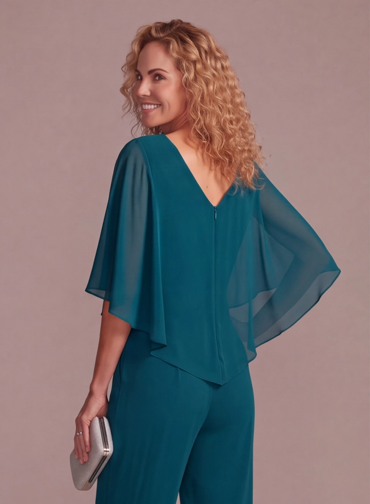 Back detail of teal cape pantsuit for formal evening and special occasions