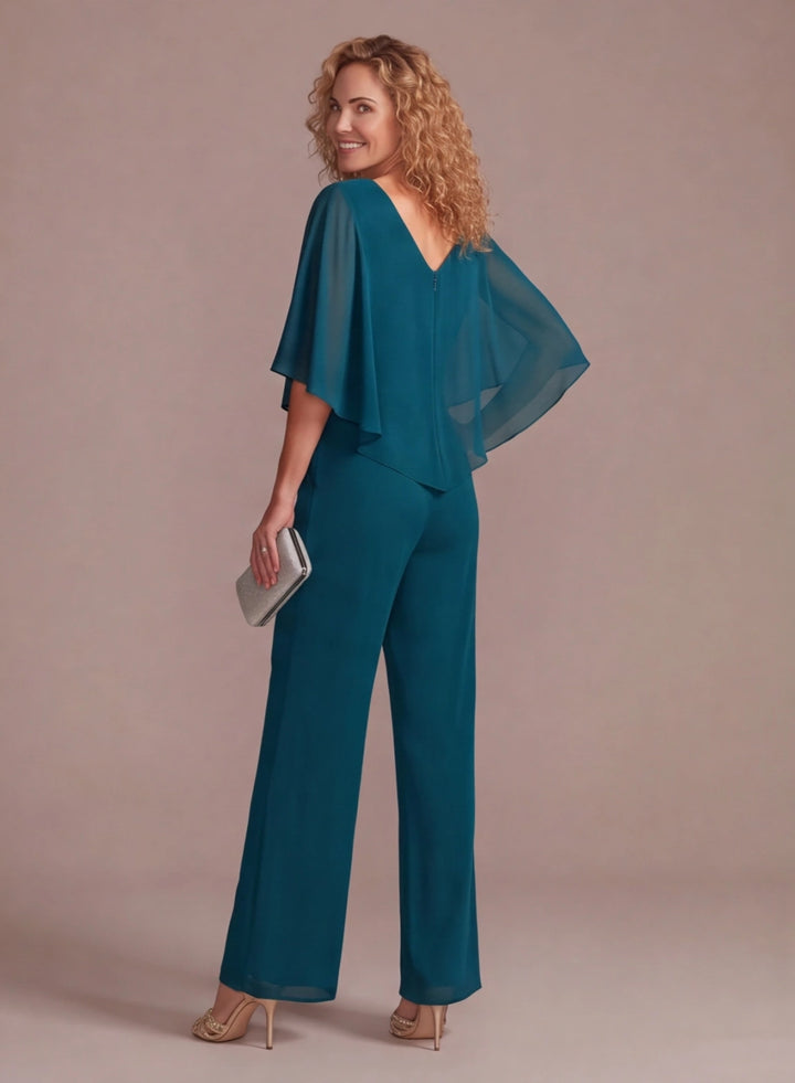 Back view of elegant teal chiffon cape pantsuit for wedding occasions