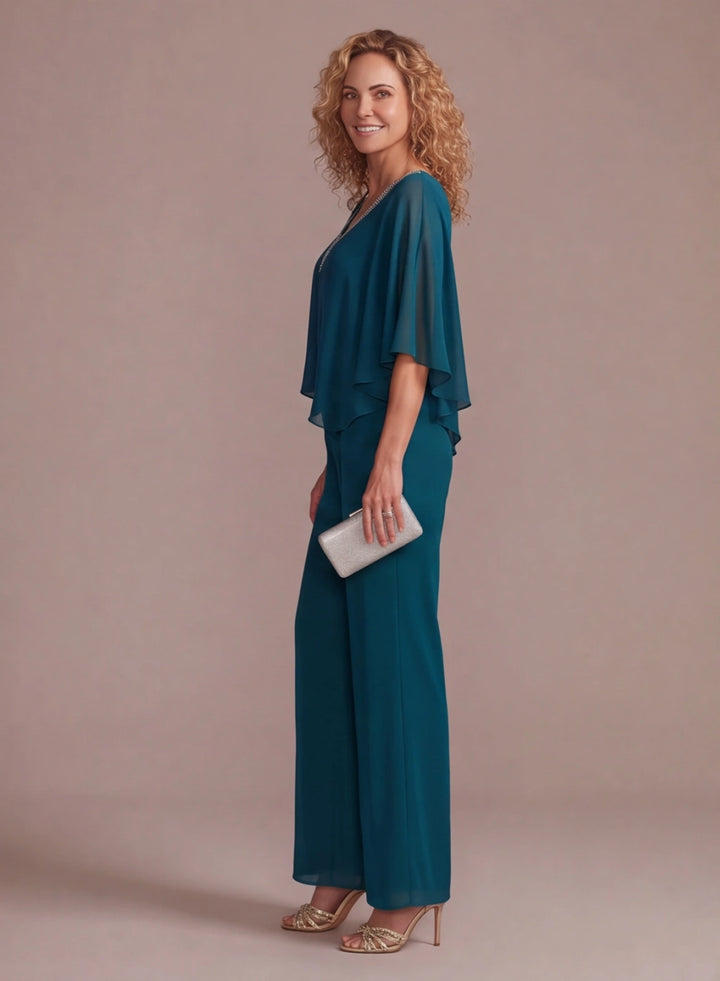 Side view of teal formal pantsuit with flowing wide leg pants for women