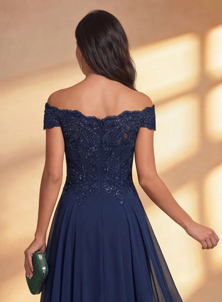Back detail of a navy off shoulder chiffon midi dress with feminine design