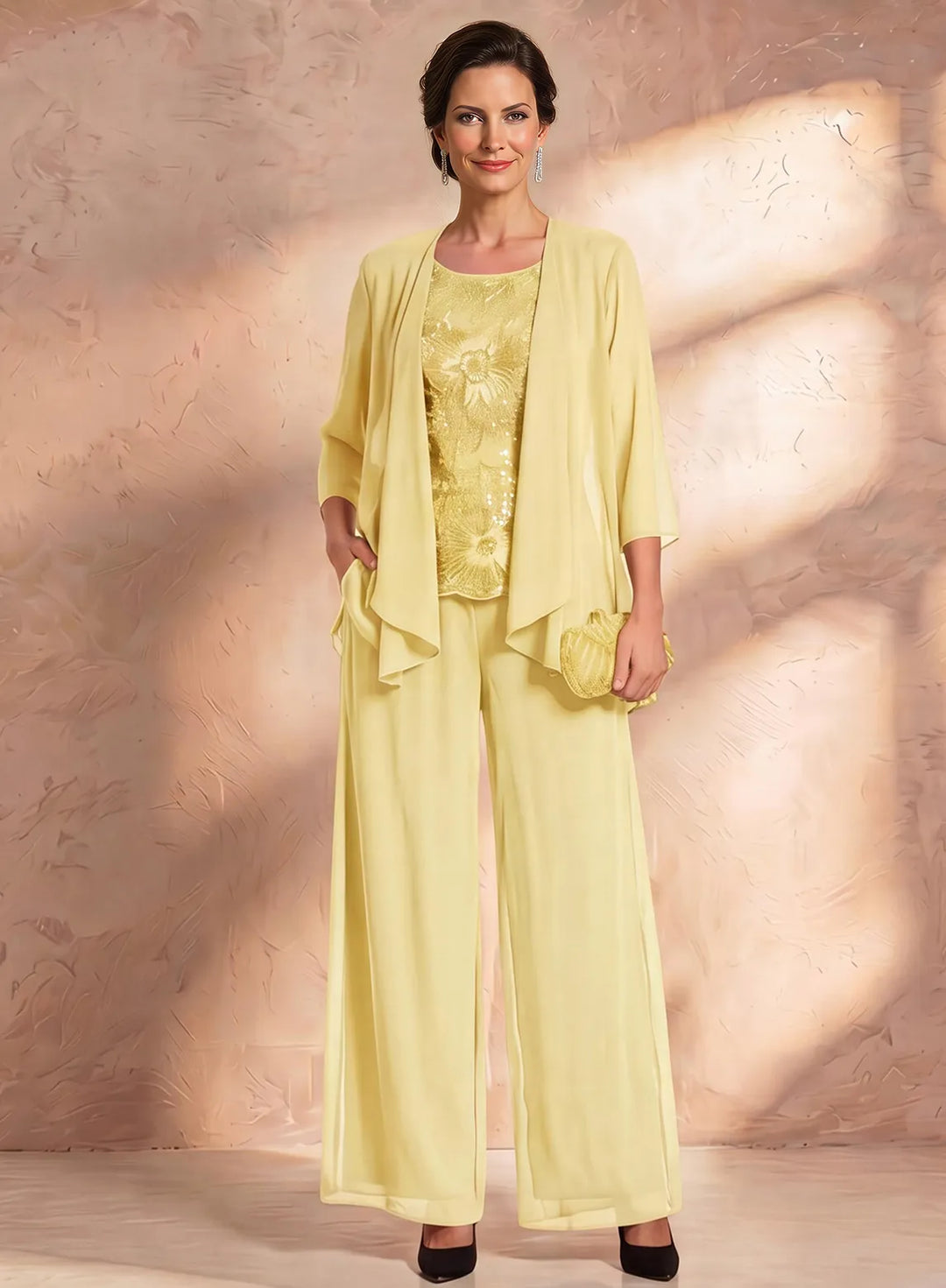 Yellow mother of the bride pantsuit with embroidered top and flowing jacket, elegant wedding guest outfit